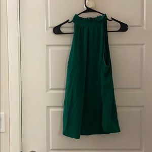 High neck sleeveless green blouse
